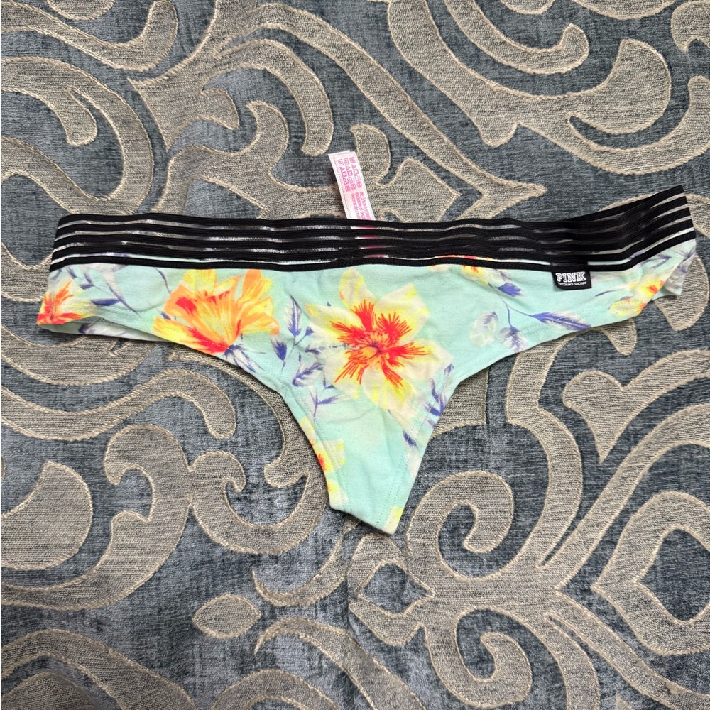 Pink Victoria secret thong size S
New with tags